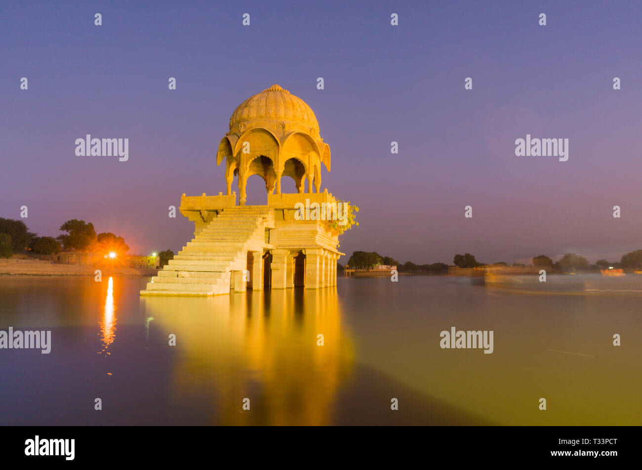 Chattri dome with steps shot at dusk with reflections at gadi sagar lake jaisalmer Stock Photo