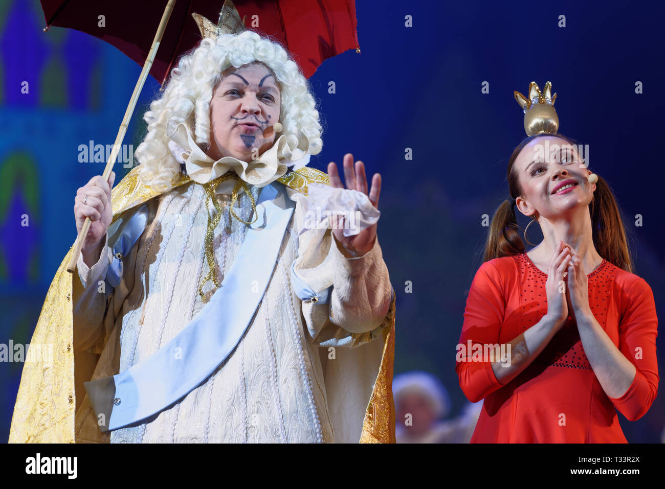 St. Petersburg, Russia - March 25, 2019: Oleg Kulikovich (left) as King and Julia Korovko as Princess in the musical Town Musicians of Bremen during i Stock Photo