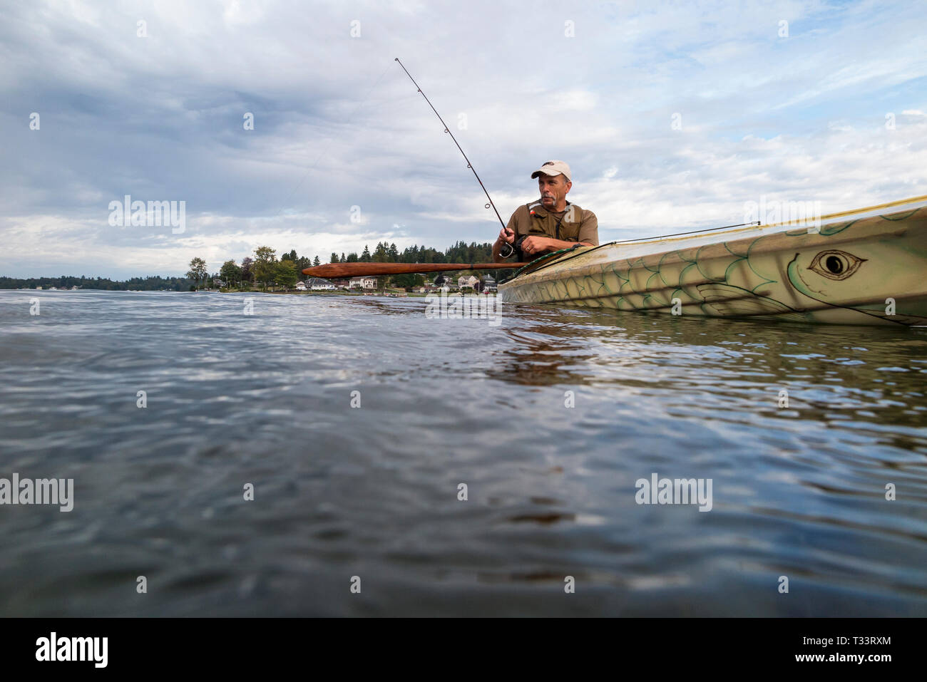 WA09969-00...WASHINGTON - Phil Russell fishing in Lake Stevens. (MR# R8) Stock Photo