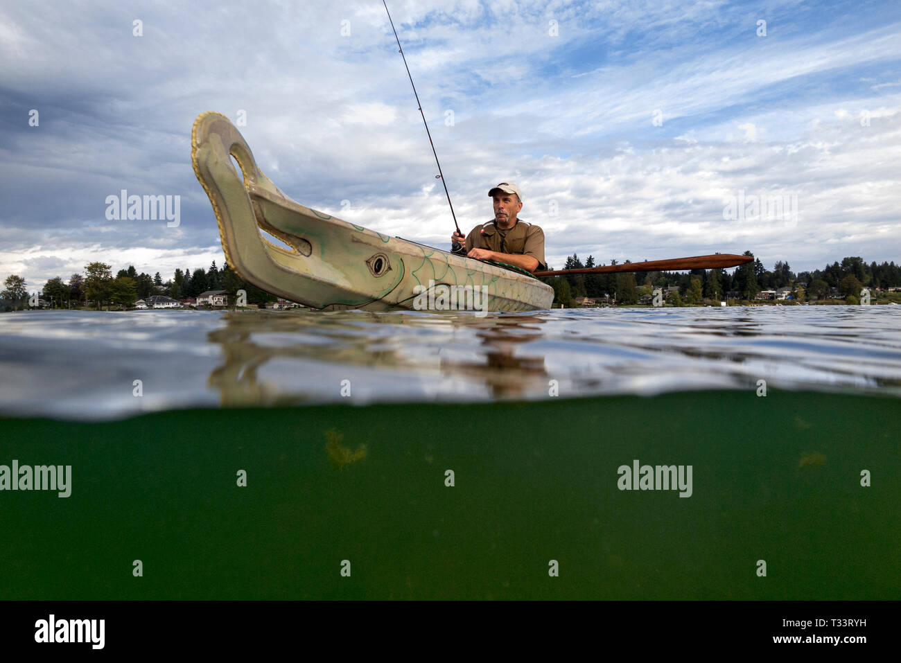 WA09968-00...WASHINGTON - Phil Russell fishing in Lake Stevens. (MR# R8) Stock Photo