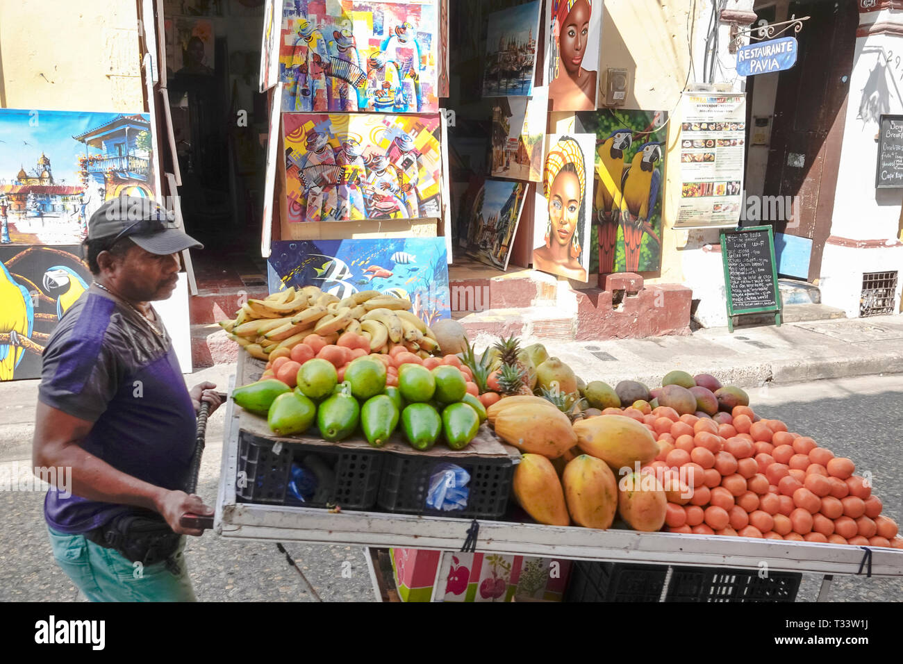 Cartagena Colombia,Center,centre,Getsemani,Hispanic Black African Africans,Afro Caribbean,resident residents,man men male,tropical fruit produce vendo Stock Photo