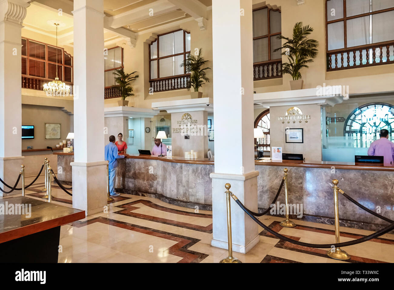 Luxury hotel reception desk hi-res stock photography and images ...