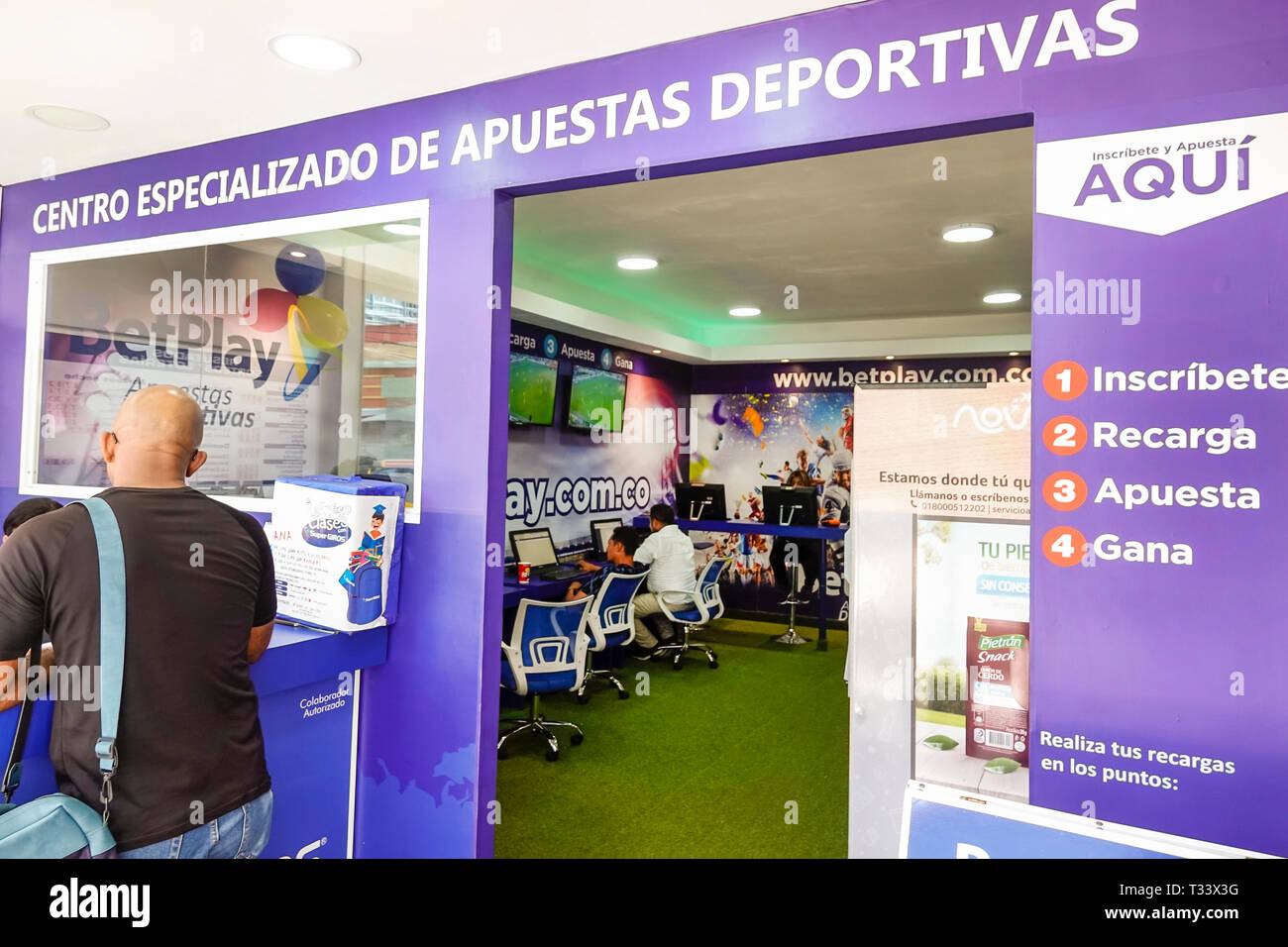 Cartagena Colombia,Bocagrande,BetPlay.com,online sports betting center,gambling,customer,sign,Spanish language,COL190121117 Stock Photo