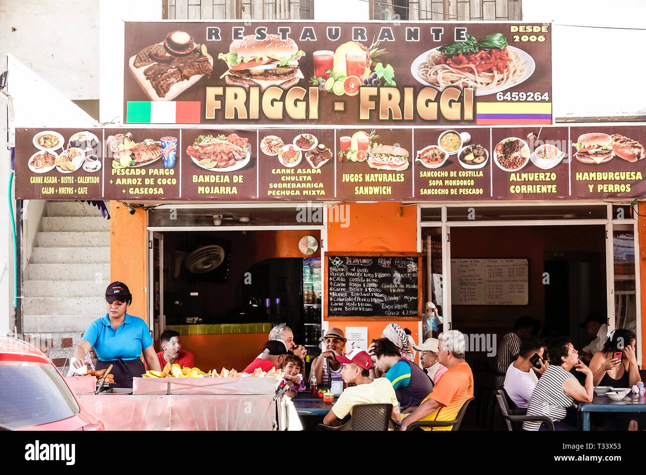 Cartagena Colombia,Bocagrande,Restaurante Friggi-Friggi,restaurant restaurants food dining cafe cafes,picture menu,rustic,dining,woman female women,wa Stock Photo
