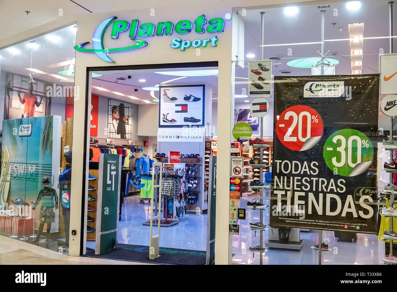 Cartagena Colombia,Bocagrande,Centro Comercial Nao plaza indoor mall,Planeta Sport,store front entrance,sports clothing,sign,discounts sale,COL1901211 Stock Photo