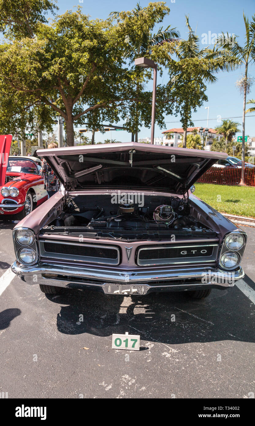 Naples, Florida, USA – March 23, 2019: Pink 1965 Pontiac GTO at the 32nd Annual Naples Depot Classic Car Show in Naples, Florida. Editorial only. Stock Photo