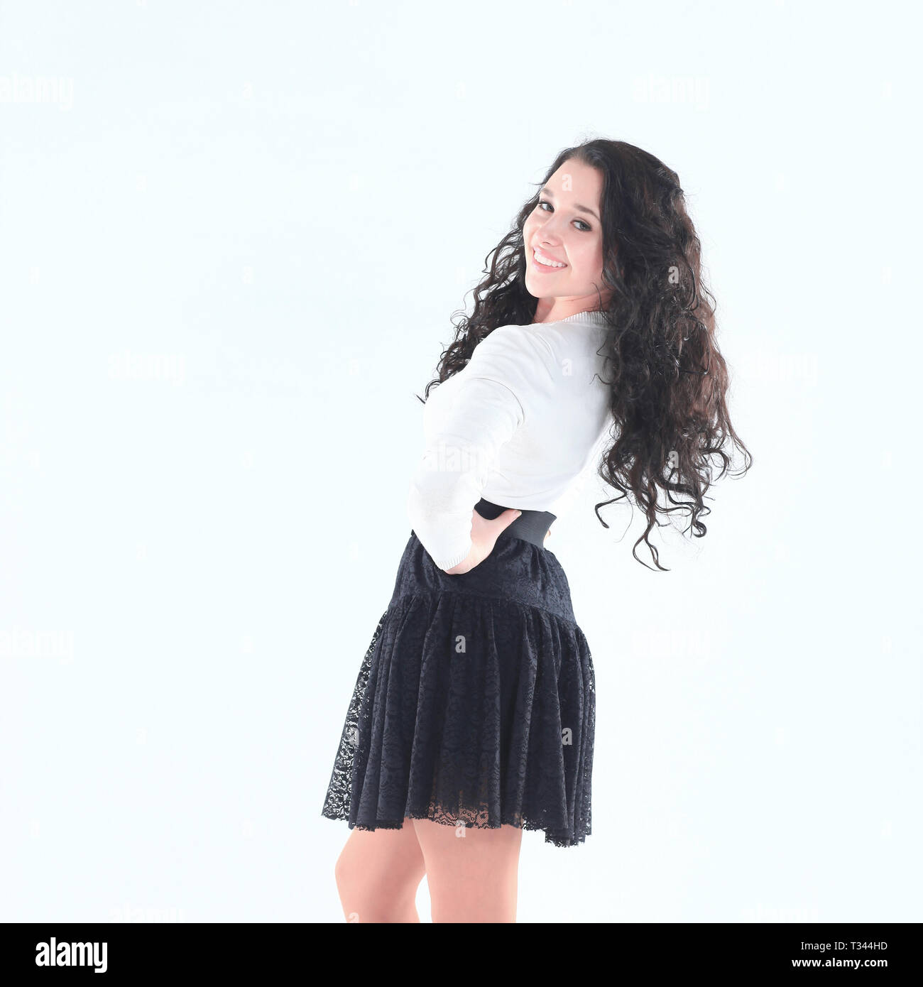 portrait of a modern young woman in a white blouse and black ski Stock ...