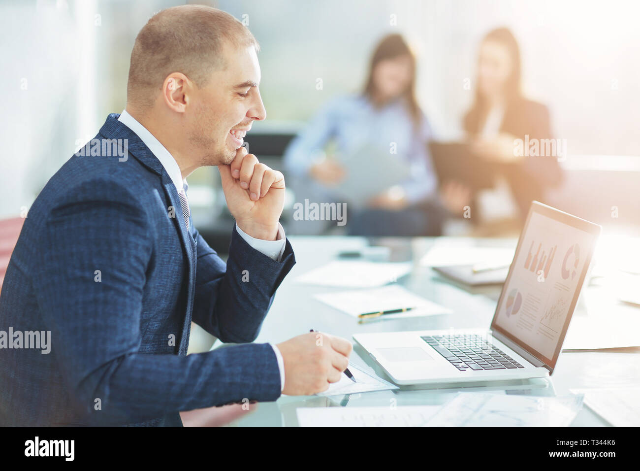 businessman using laptop to check financial data Stock Photo