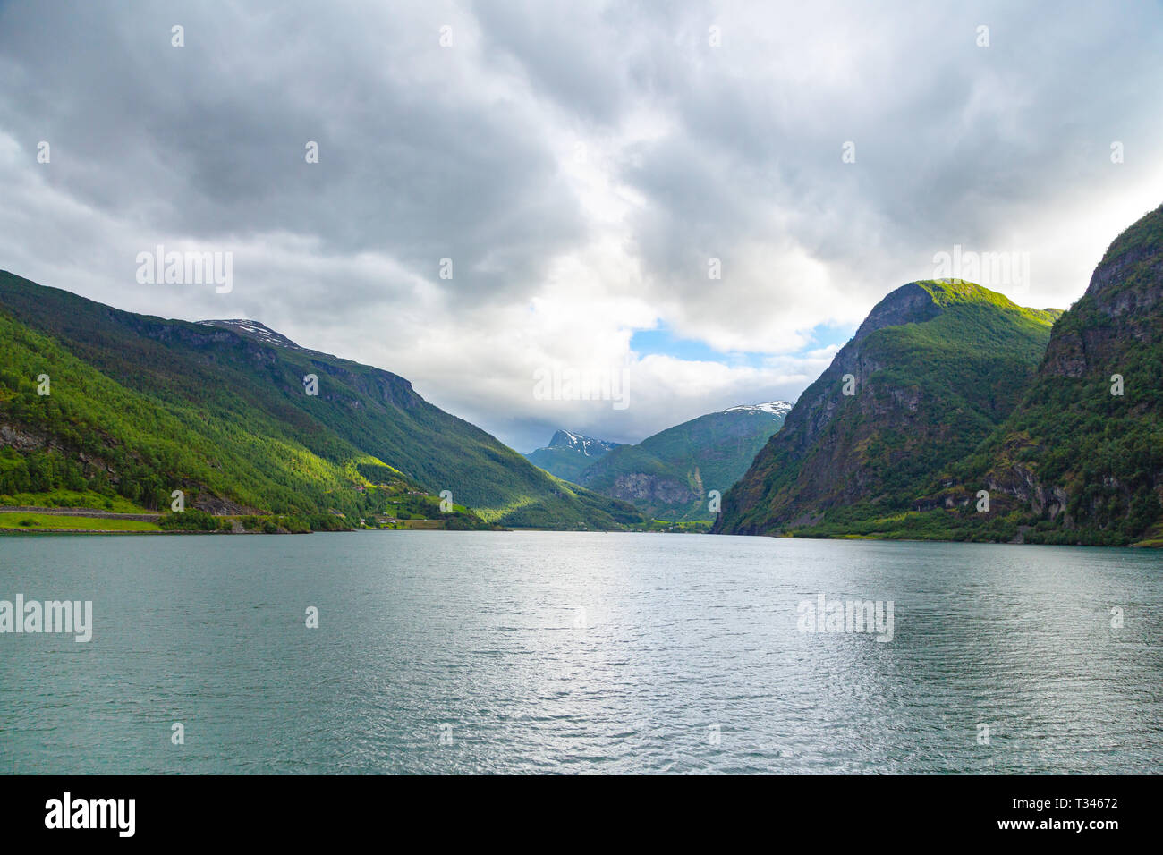 Fjord in Norway - nature and travel background. Beautiful view of the coast of fjord on a summer day. Stock Photo