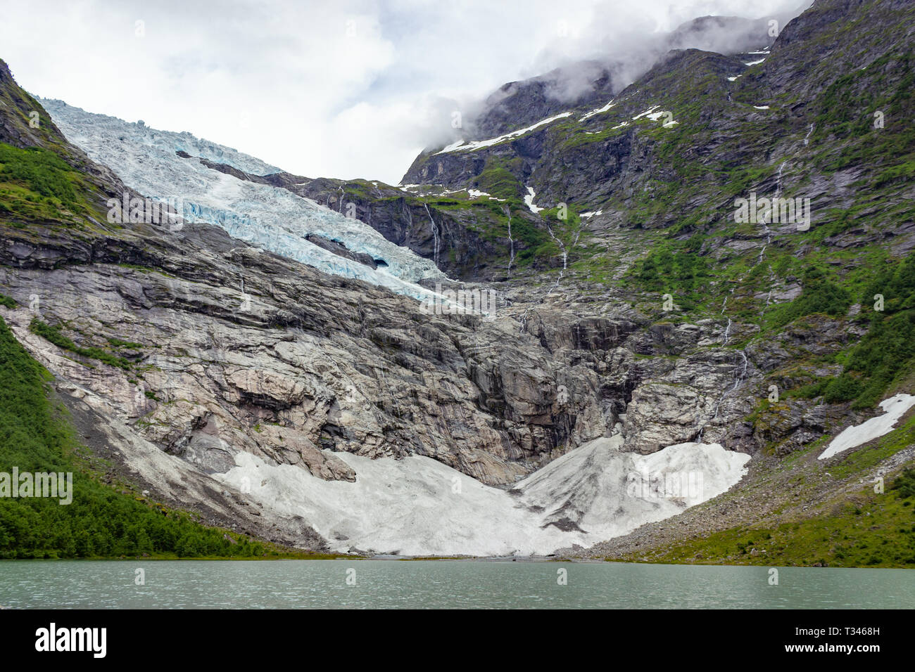 Briksdal or Briksdalsbreen glacier with melting blue ice, Norway nature