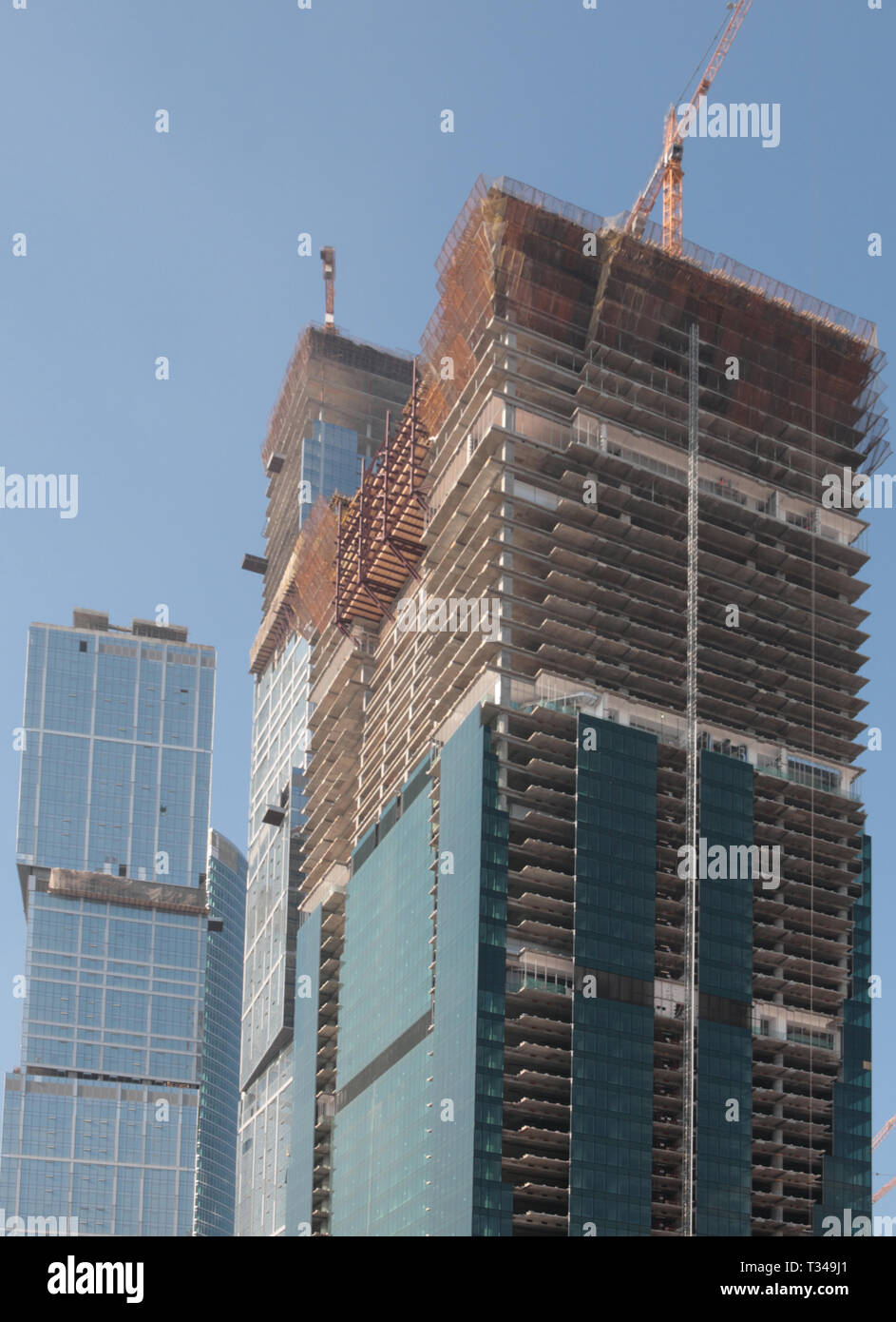 skyscraper develop on sky background at day Stock Photo - Alamy