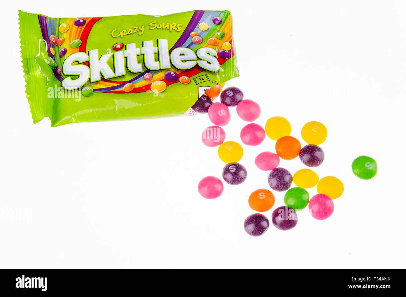 Skittles fruitflavoured candies isolated on white background Stock