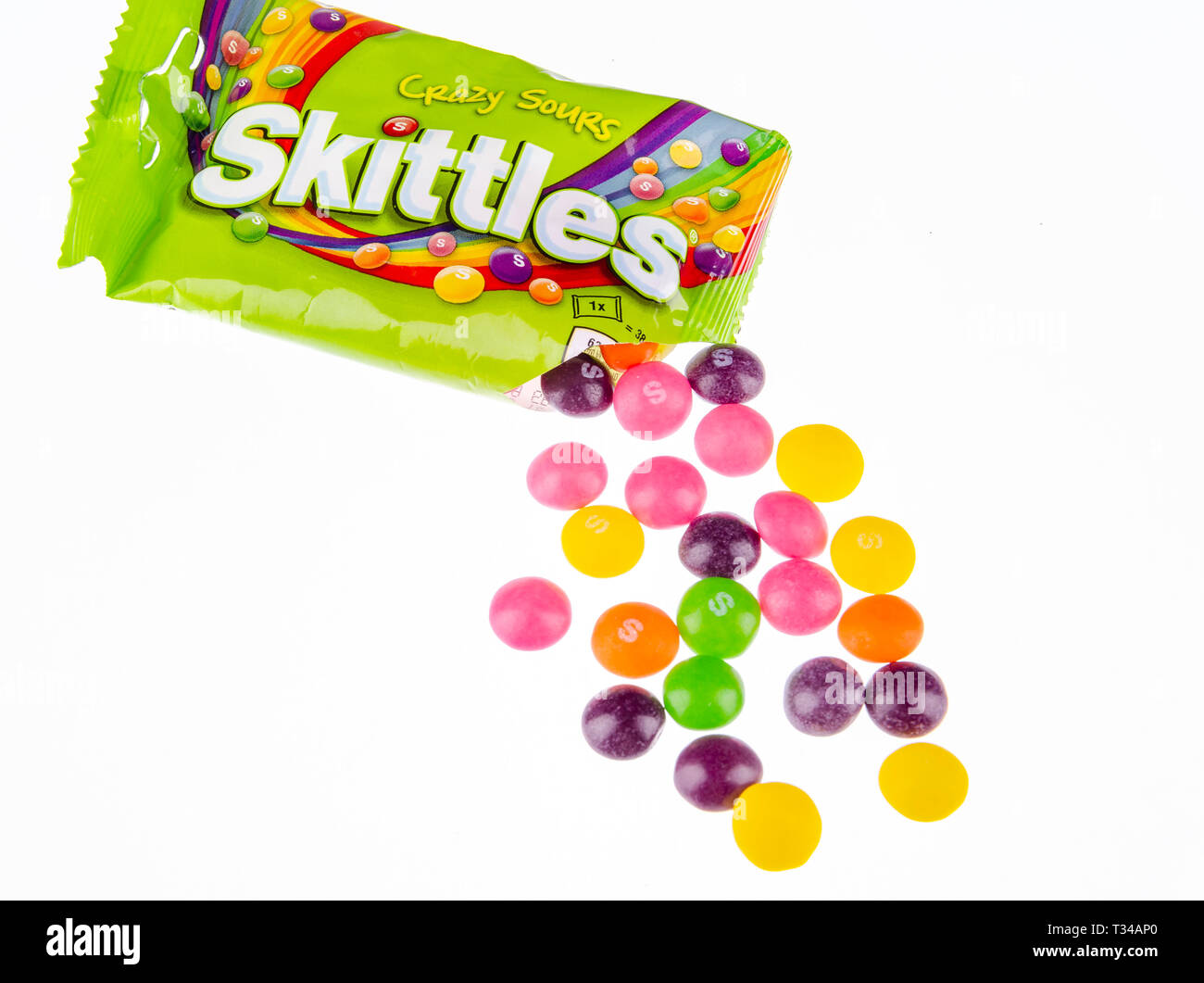 Skittles fruitflavoured candies isolated on white background Stock