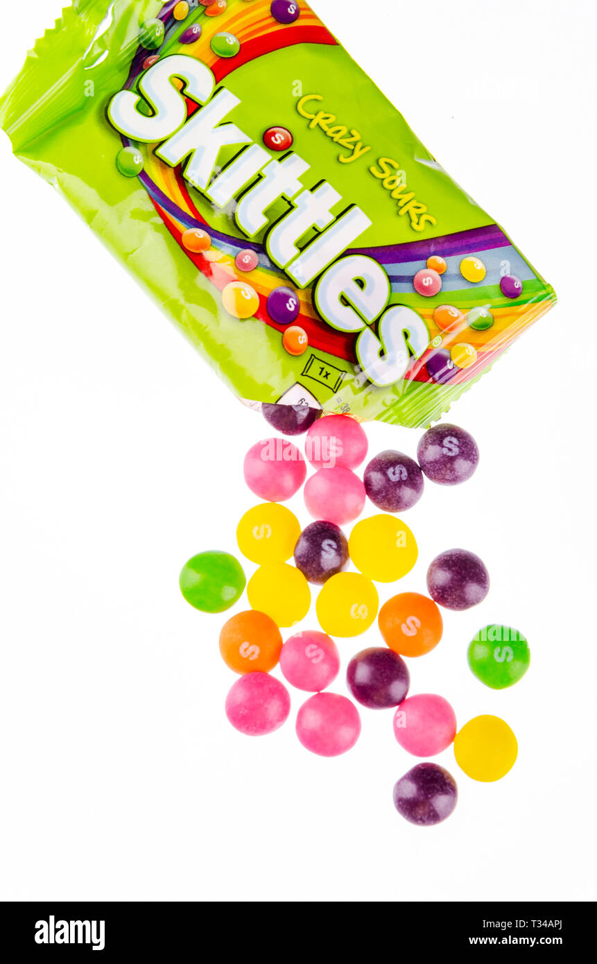 Skittles fruitflavoured candies isolated on white background Stock