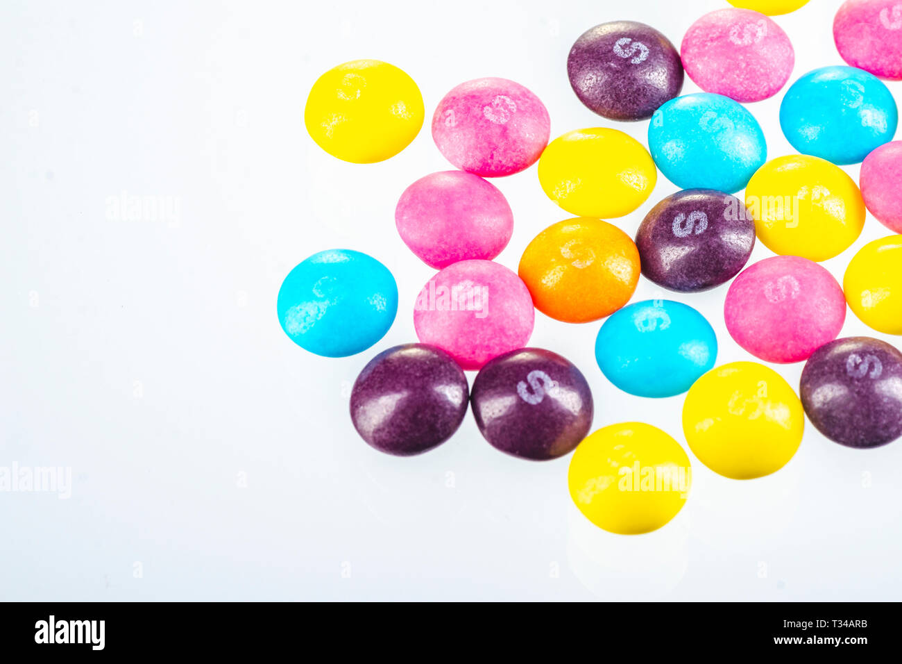 Skittles fruitflavoured candies isolated on white background Stock