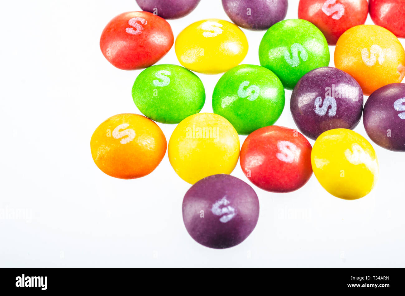 Skittles fruitflavoured candies isolated on white background Stock