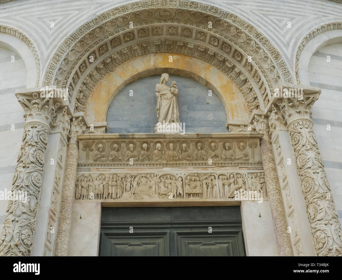 close up shot of the intricate architectural detail on the baptistry, pisa Stock Photo
