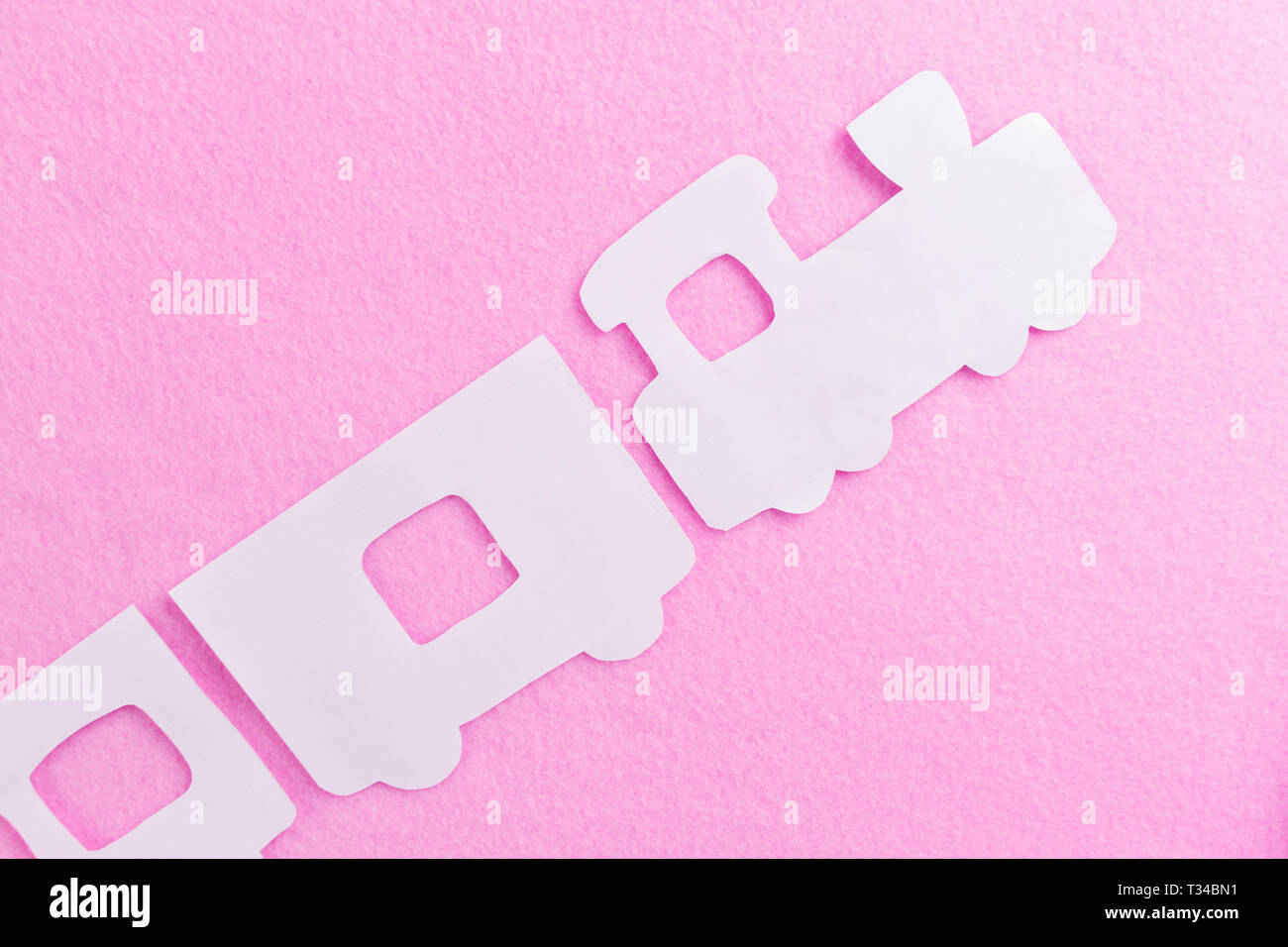 train on pink background. travel concept image Stock Photo