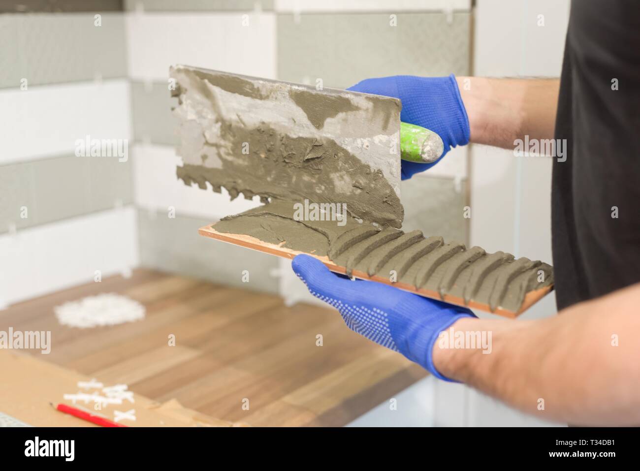 Repair And Construction Of The Kitchen Hands Of Tiler Installing
