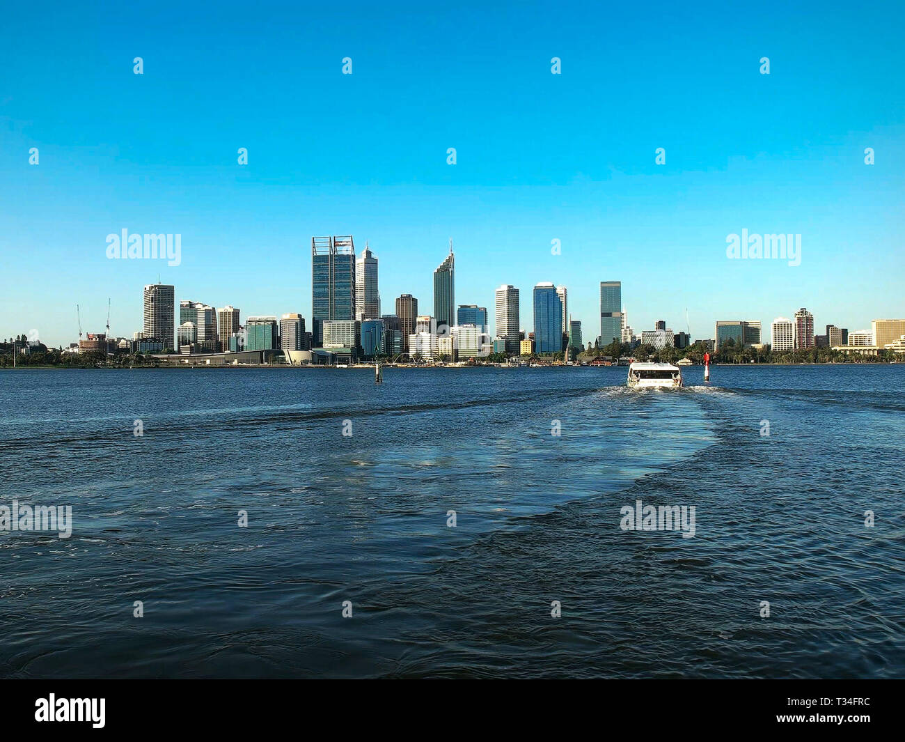 perth skyline and mends street ferry in wa Stock Photo