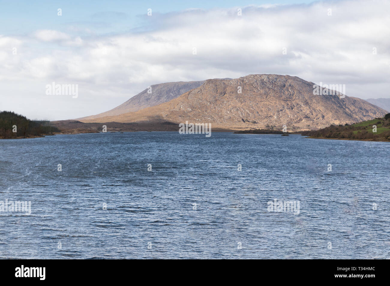 Mountain, lake and vegetation at Western way trail in Lough Corrib, Maam Cross, Galway, Ireland Stock Photo