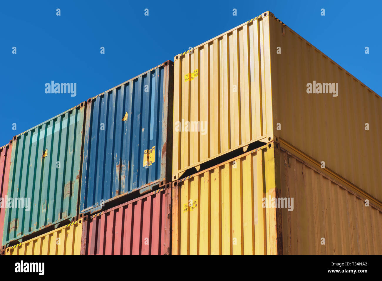 Row blue metal shipping containers hires stock photography and images