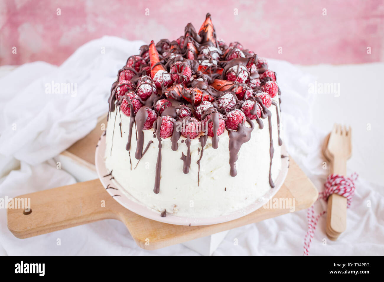 Raspberry and strawberry cream cake with chocolate Stock Photo Alamy