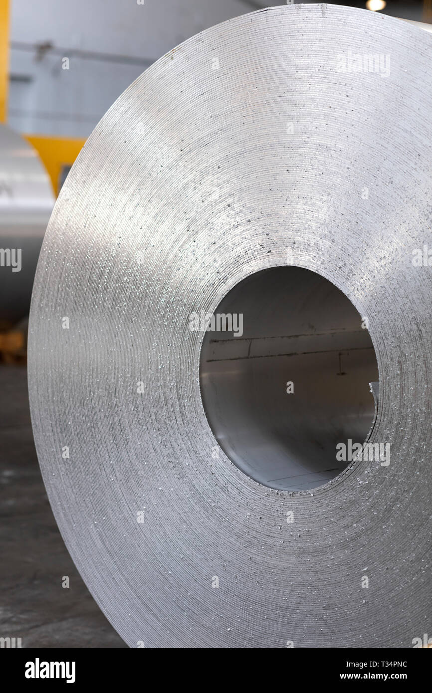 wall texture of aluminum coil stored waiting for the process just after continuous caster machine. Stock Photo