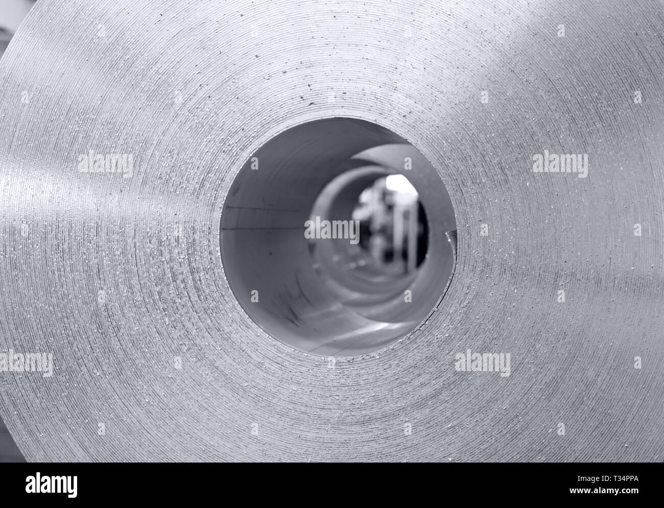 wall texture of aluminum coil stored waiting for the process just after continuous caster machine. Black and white photo for cover magazine Stock Photo