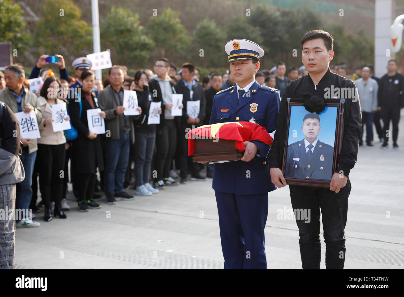 Hanzhong, China's Shaanxi Province. 6th Apr, 2019. A ceremony is held to receive the bone ashes of fireman Gao Jikai, who died while fighting a forest fire in southwest China's Sichuan Province, in Lueyang, northwest China's Shaanxi Province, April 6, 2019. The bone ashes of fireman Gao Jikai returned to his hometown of Lueyang in Shaanxi Province on Saturday. Credit: Wang Wei/Xinhua/Alamy Live News Stock Photo