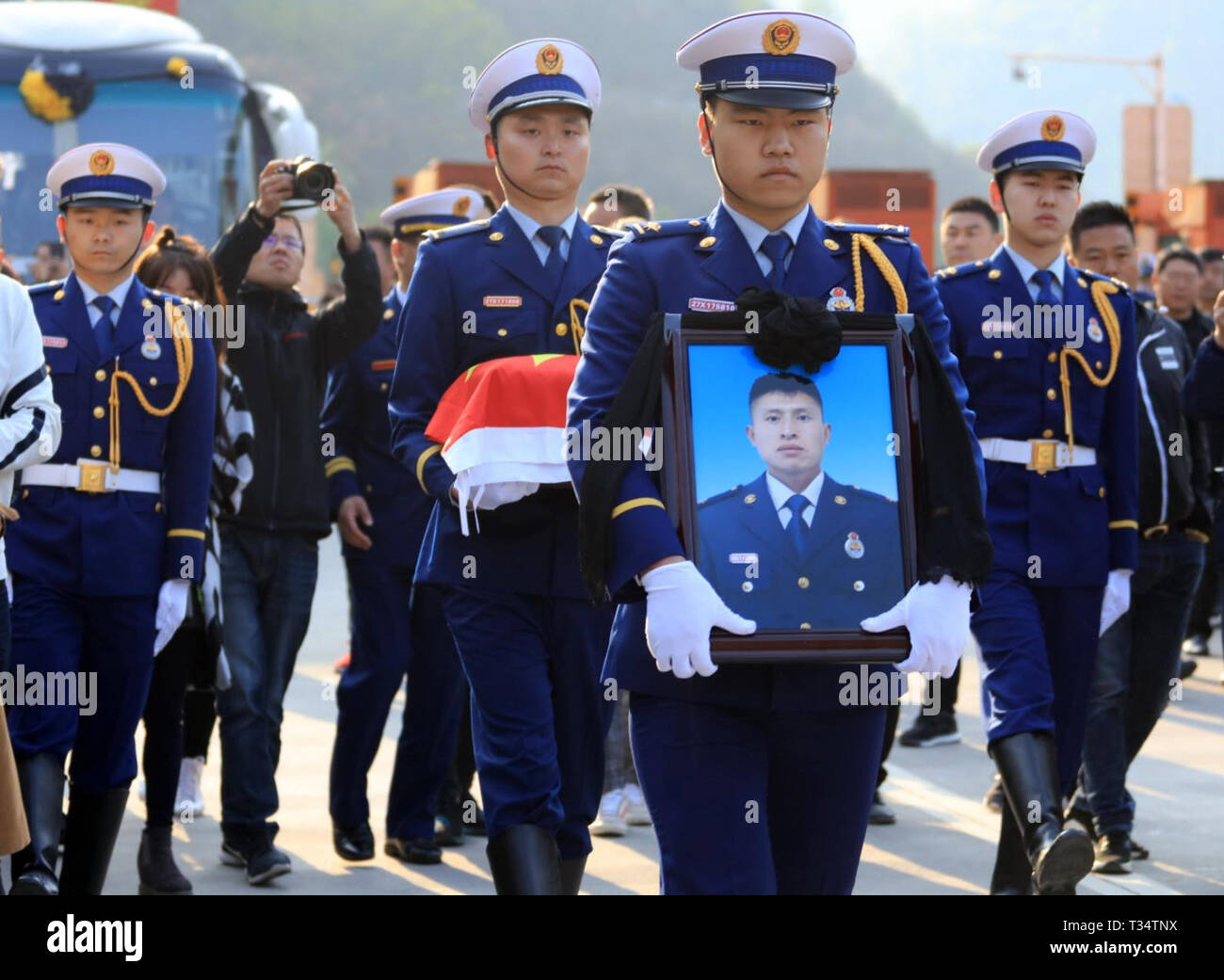 Hanzhong, China's Shaanxi Province. 6th Apr, 2019. A ceremony is held to receive the bone ashes of fireman Gao Jikai, who died while fighting a forest fire in southwest China's Sichuan Province, in Lueyang, northwest China's Shaanxi Province, April 6, 2019. The bone ashes of fireman Gao Jikai returned to his hometown of Lueyang in Shaanxi Province on Saturday. Credit: Wang Wei/Xinhua/Alamy Live News Stock Photo