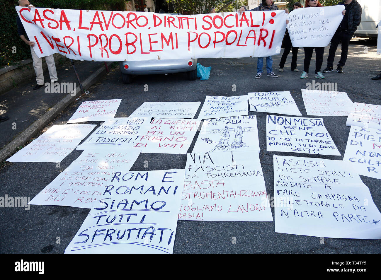 Rome, Italy. 06th Apr, 2019. Banner: House, work and social rights, the real problems Rome April 6th 2019. Counterdemonstration of activists from the anti-fascist movements in the Torre Maura district of Rome, two days after Rome residents and neo-fascists burned bins and shouted racist slogans at Roma families being temporarily hosted in their neighbourhood.  photo di Samantha Zucchi/Insidefoto Credit: insidefoto srl/Alamy Live News Stock Photo
