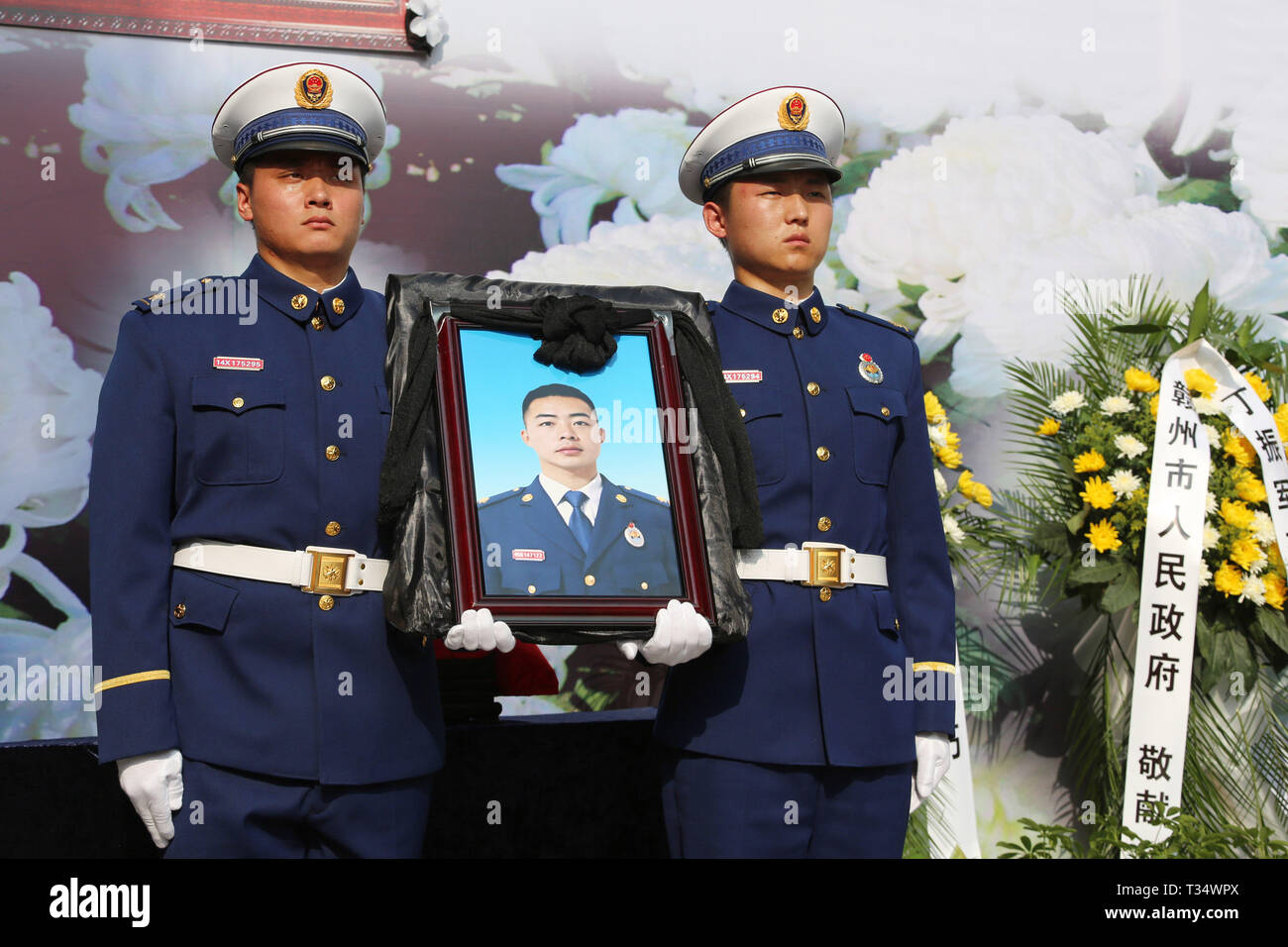 Ganzhou, China's Jiangxi Province. 6th Apr, 2019. A ceremony is held to receive the bone ashes of fireman Ding Zhenjun, who died while fighting a forest fire in southwest China's Sichuan Province, in Yudu County of Ganzhou, east China's Jiangxi Province, April 6, 2019. The bone ashes of fireman Ding Zhenjun returned to his hometown of Yudu County in Jiangxi Province on Saturday. Credit: Chen Dichang/Xinhua/Alamy Live News Stock Photo