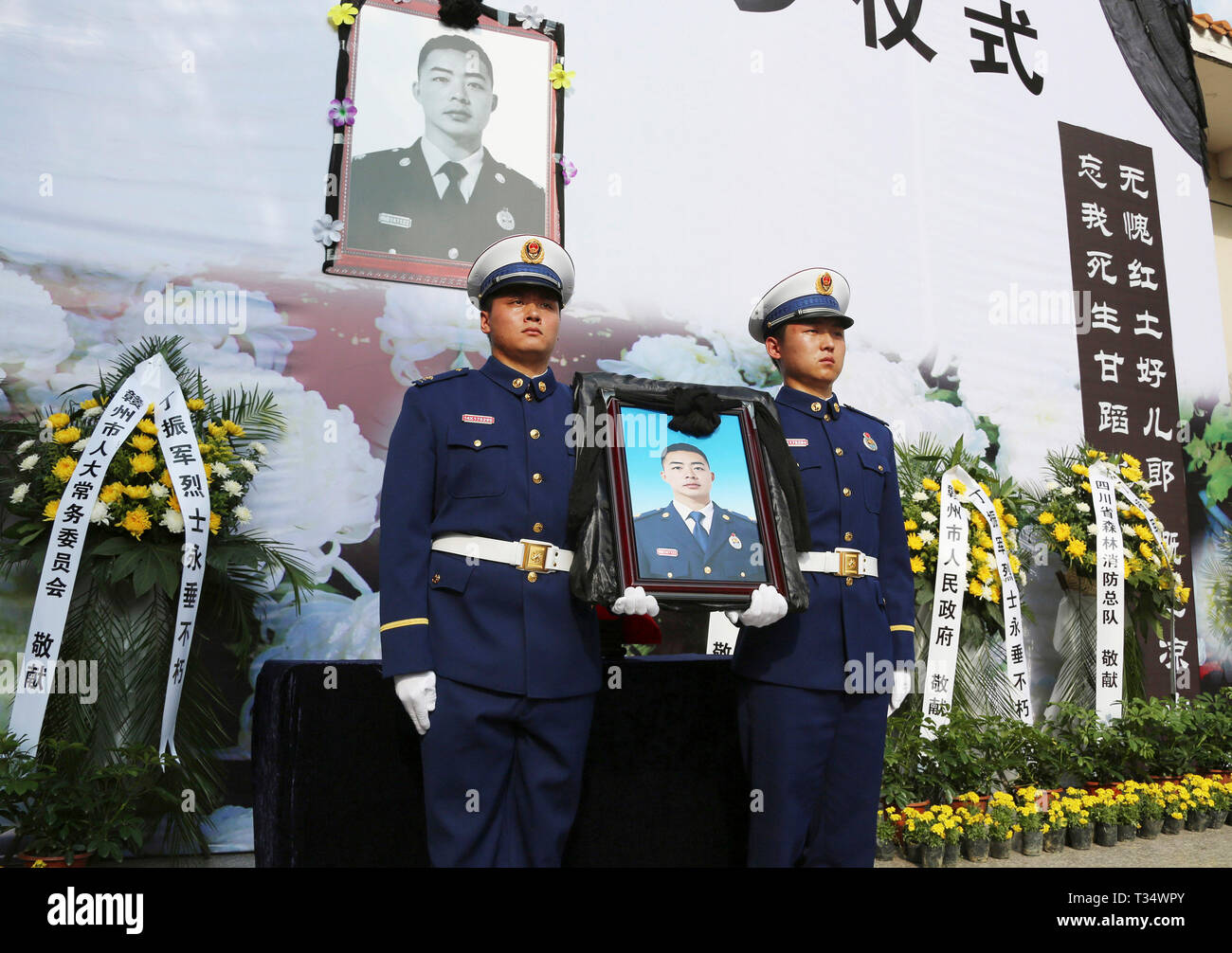 Ganzhou, China's Jiangxi Province. 6th Apr, 2019. A ceremony is held to receive the bone ashes of fireman Ding Zhenjun, who died while fighting a forest fire in southwest China's Sichuan Province, in Yudu County of Ganzhou, east China's Jiangxi Province, April 6, 2019. The bone ashes of fireman Ding Zhenjun returned to his hometown of Yudu County in Jiangxi Province on Saturday. Credit: Chen Dichang/Xinhua/Alamy Live News Stock Photo