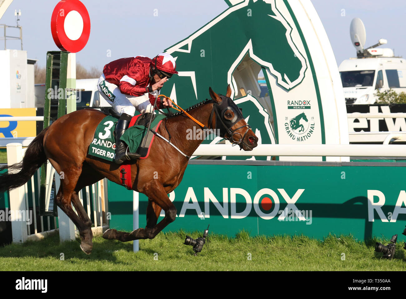 AINTREE, Liverpool, UK. 6th Apr, 2019. Tiger Roll winner of the 2019 Randox Grand National ridden by D N Russell. He becomes the first horse to since Red Rum 45 years ago to win the event race back-to-back. 40 runners, 30 fences and more than four-and-a-quarter miles, the National is the ultimate test for horses and riders. Stock Photo