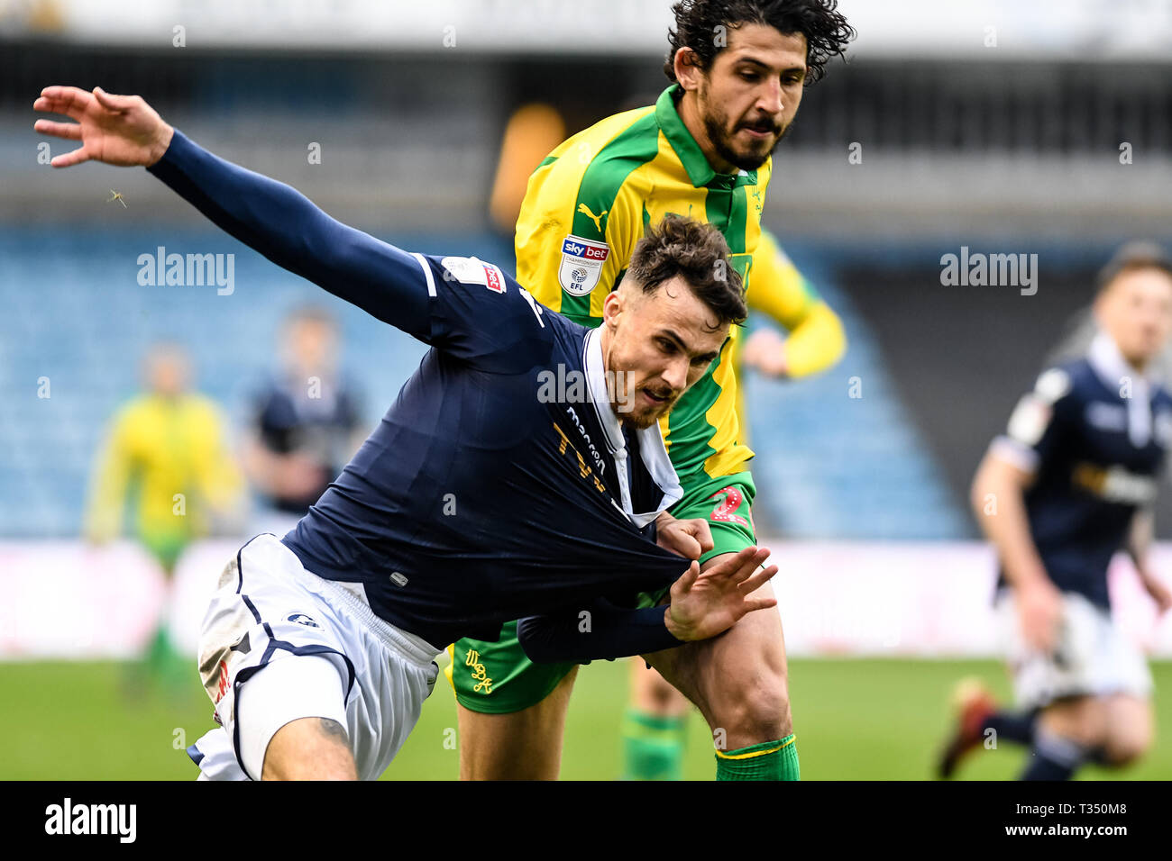 London, UK. 06th Apr, 2019. Lee Gregory of Millwall and Ahmed Hegazy of West Bromwich Albion during the EFL Sky Bet Championship match between Millwall and West Bromwich Albion at The Den, London, England on 6 April 2019. Photo by Adamo Di Loreto.  Editorial use only, license required for commercial use. No use in betting, games or a single club/league/player publications. Stock Photo