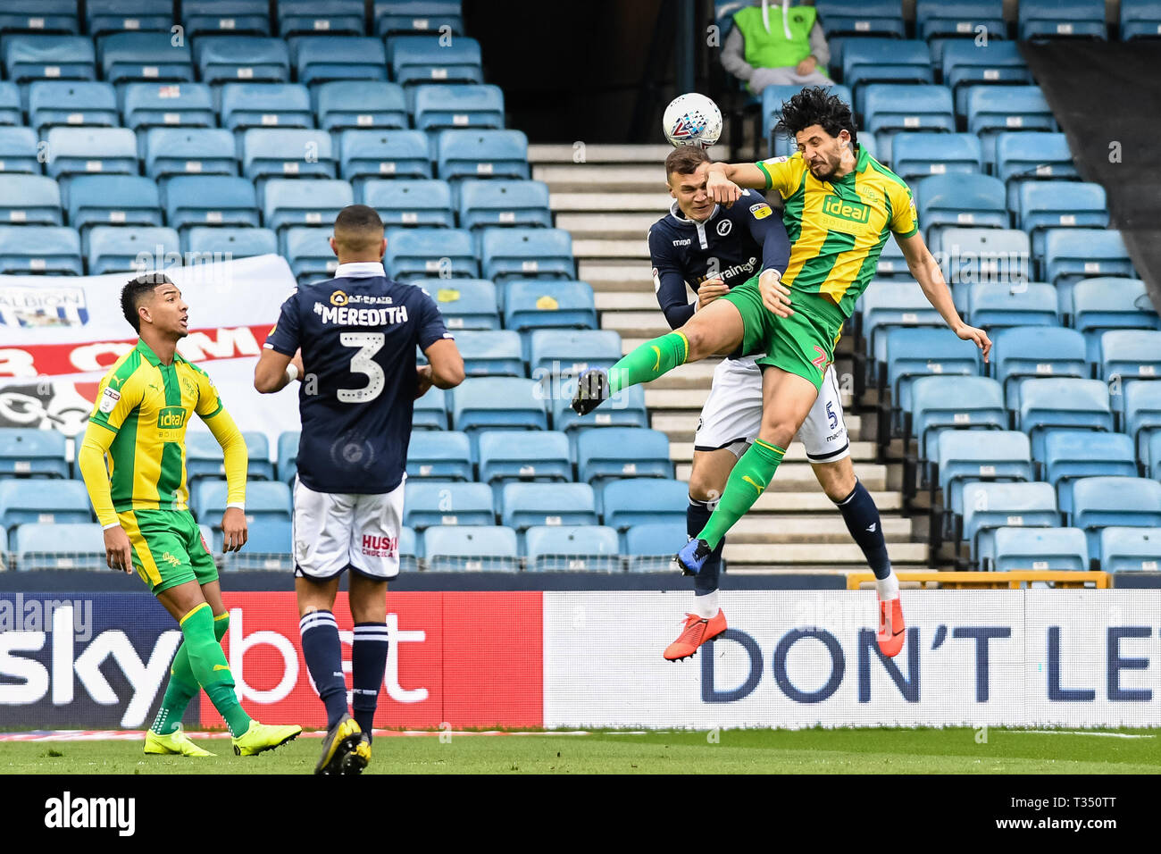 London, UK. 06th Apr, 2019. Jake Cooper of Millwall and Ahmed Hegazy of West Bromwich Albion during the EFL Sky Bet Championship match between Millwall and West Bromwich Albion at The Den, London, England on 6 April 2019. Photo by Adamo Di Loreto.  Editorial use only, license required for commercial use. No use in betting, games or a single club/league/player publications. Stock Photo