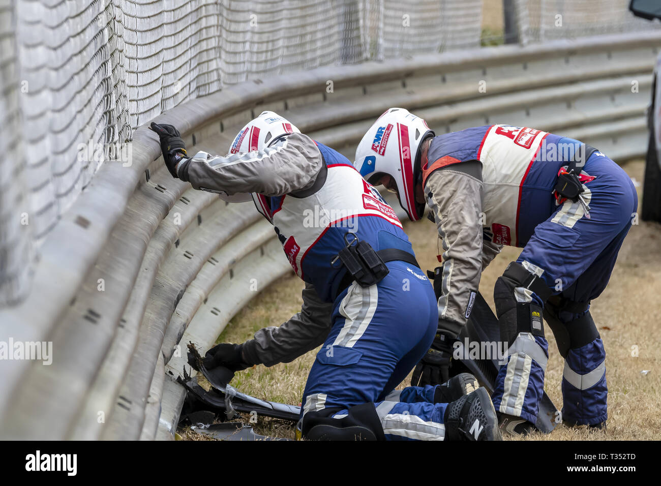 Birmingham, Alabama, USA. 6th Apr, 2019. The AMR Safety Crew work on the accident site by MARCUS ERICSSON (R) (7) of Sweden as he brings out a caution during practice for the Honda Indy Grand Prix of Alabama at Barber Motorsports Park in Birmingham, Alabama. (Credit Image: © Walter G Arce Sr Asp Inc/ASP) Stock Photo