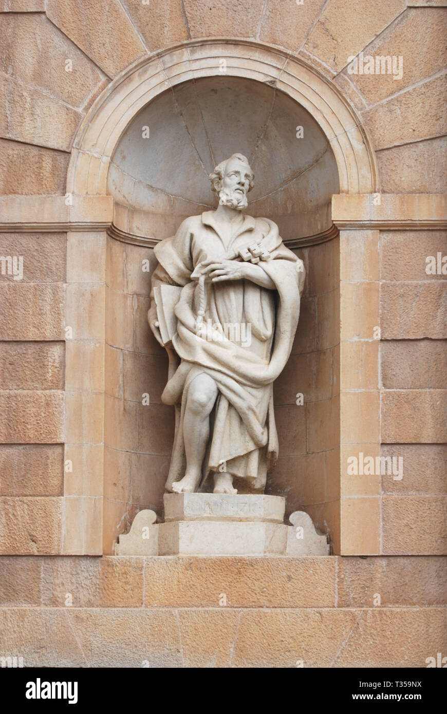 statue of st peter apostle pietro apostolo on the facade of st lawrence