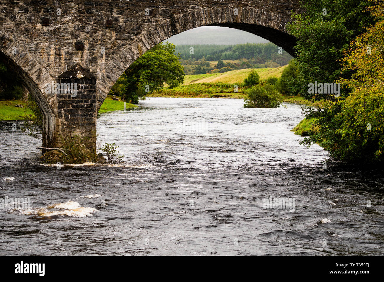 Stone masonry arch bridge crossing River Cassley at Invercassley, Lairg ...