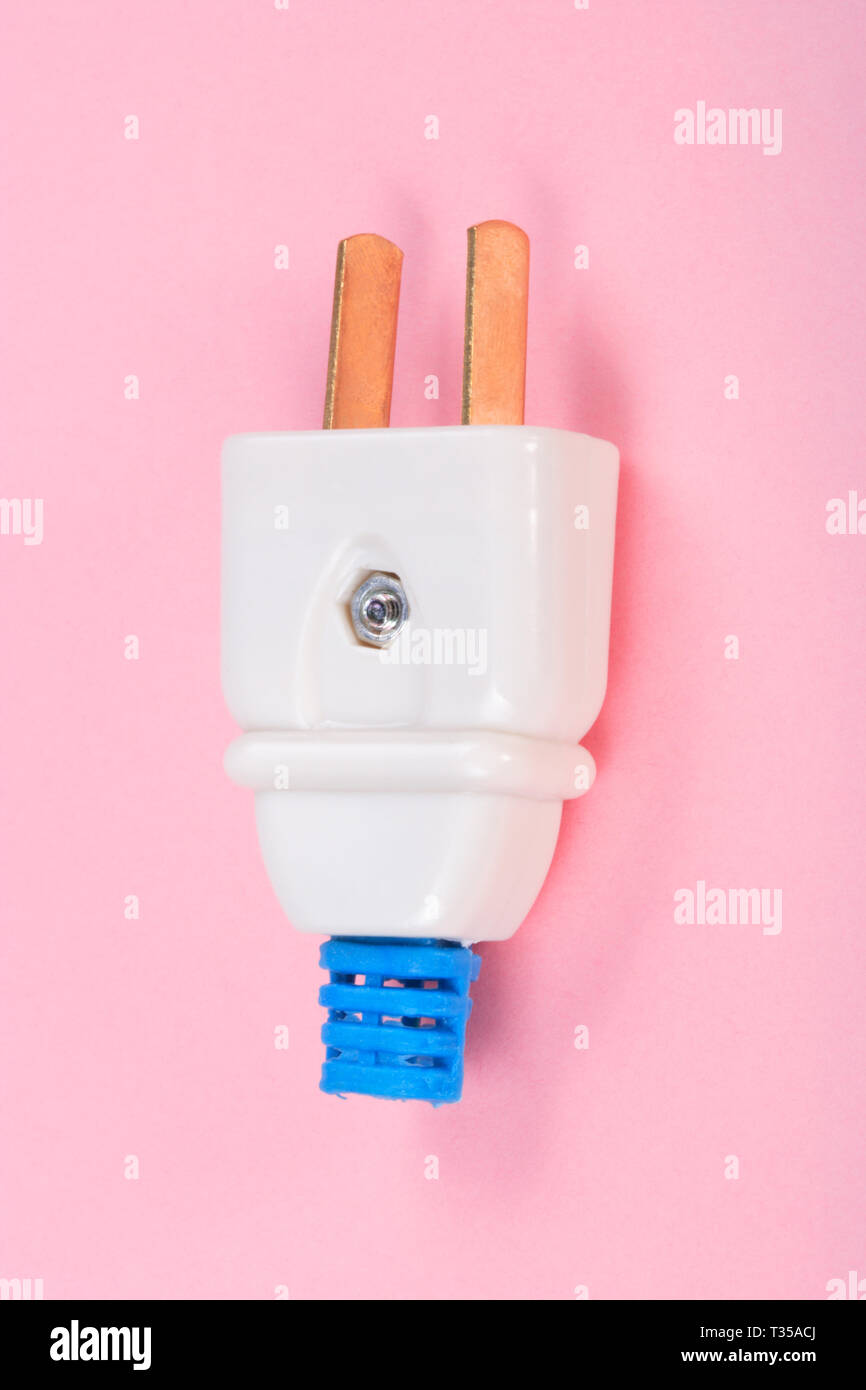 American Outlet Plug on pink background Stock Photo - Alamy