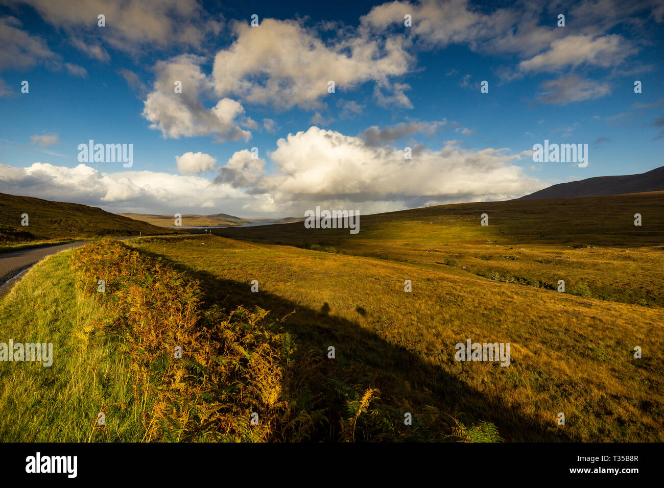 Looking down from the hills with Loch Loyal in the distance of this autumn image of the Scottish Highlands. Stock Photo
