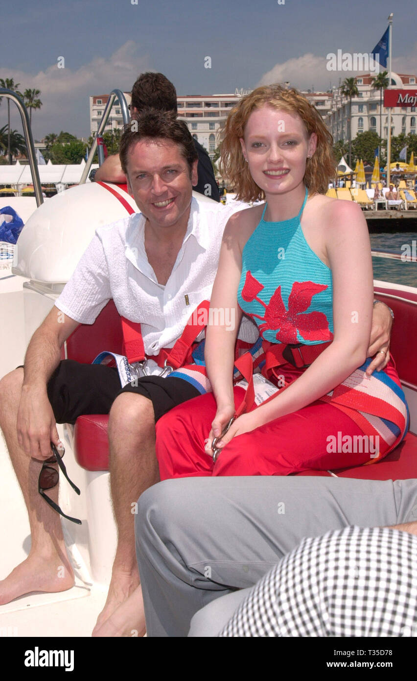 CANNES, FRANCE. May 13, 2001: Former model KELLY HARRISON (star of BBC's Paddington Green & Casualty) & actor/comedian BRIAN CONLEY parascending in the bay of Cannes where they are currently promoting their new movie Dream. © Paul Smith/Featureflash Stock Photo