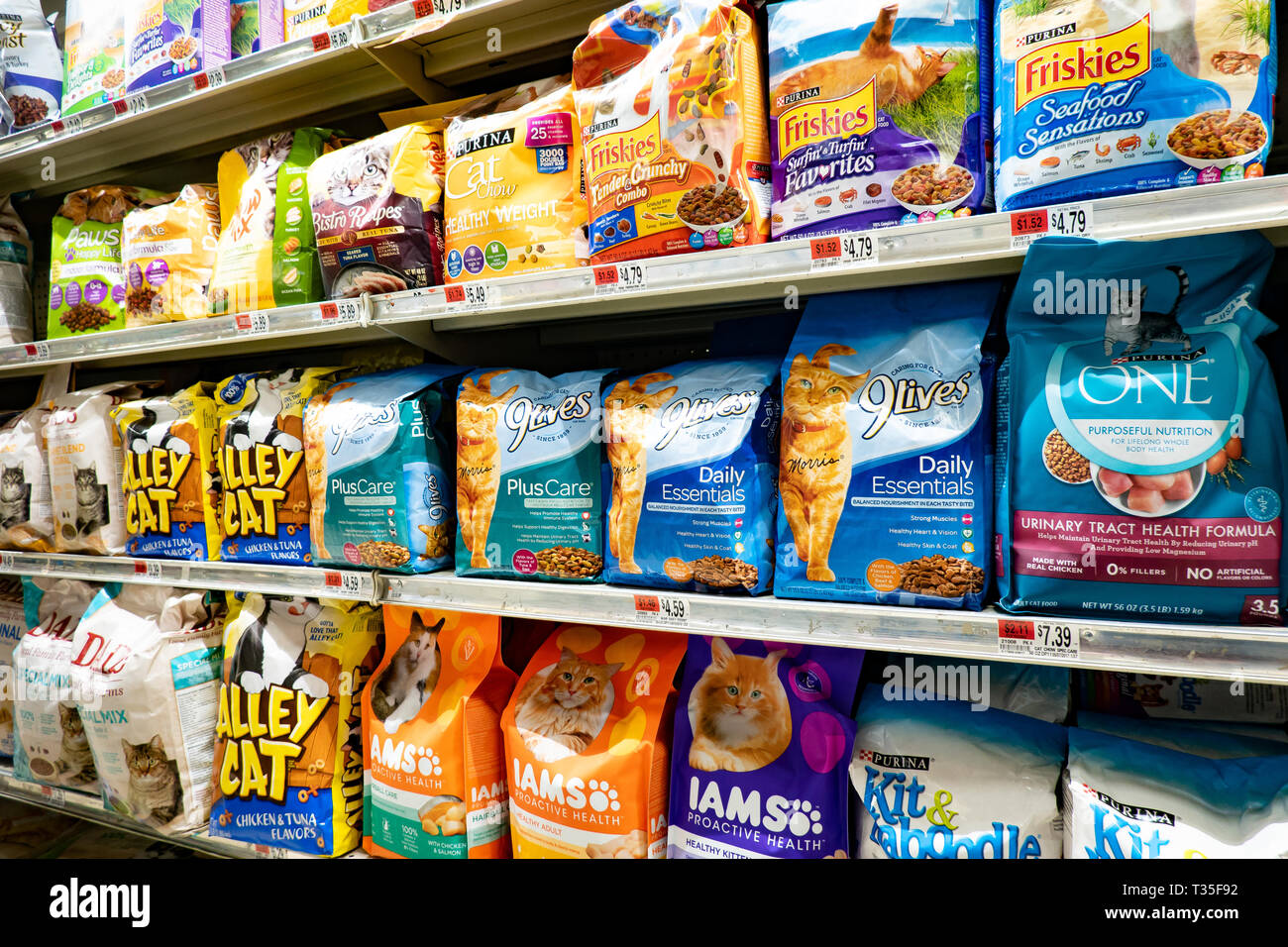 Shelves full of cat food for sale in a grocery store in Speculator, NY USA Stock Photo