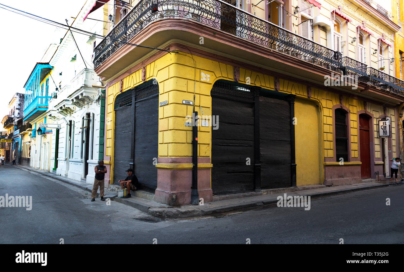 Colorful building facade at corner of Empedrado and Cuba streets in Havana, Cuba Stock Photo