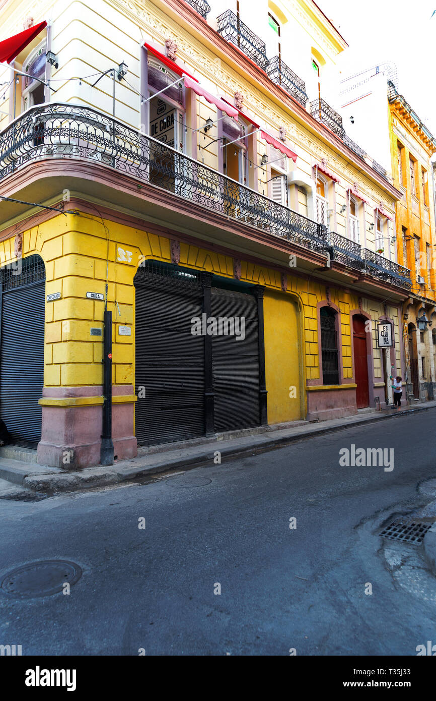 Colorful building facade at corner of Empedrado and Cuba streets in Havana, Cuba Stock Photo