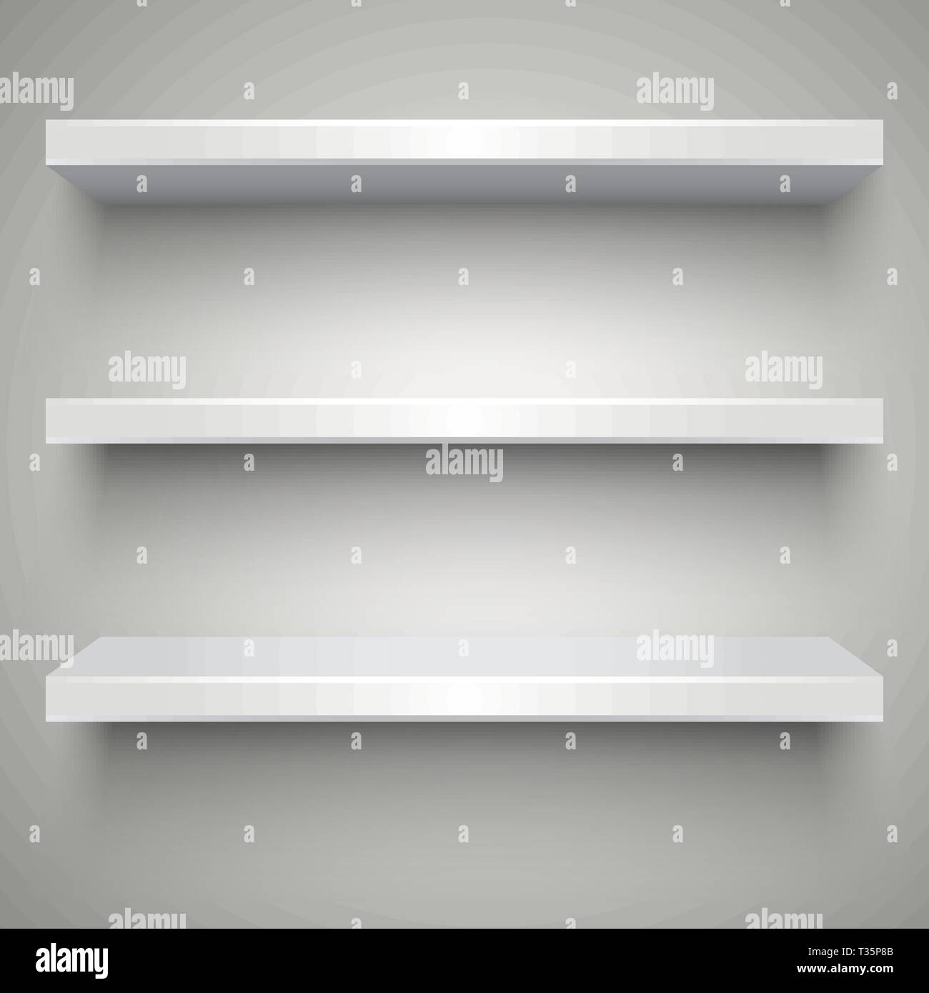 Three empty white plastic shelves with shadows on grey light background ...