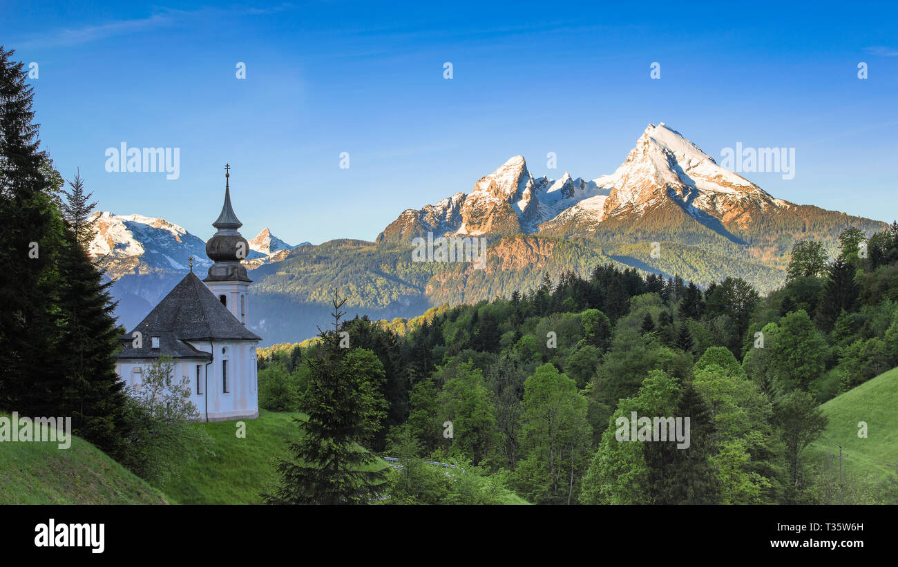 Destination scenery in Bavarian national park Berchtesgaden with Maria Gern chapel and snowy Watzmann mountain Stock Photo