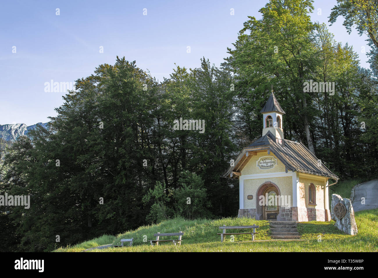 Sunlight morning view of tourist attraction small chapel in Bavarian national park Berchtesgaden Stock Photo