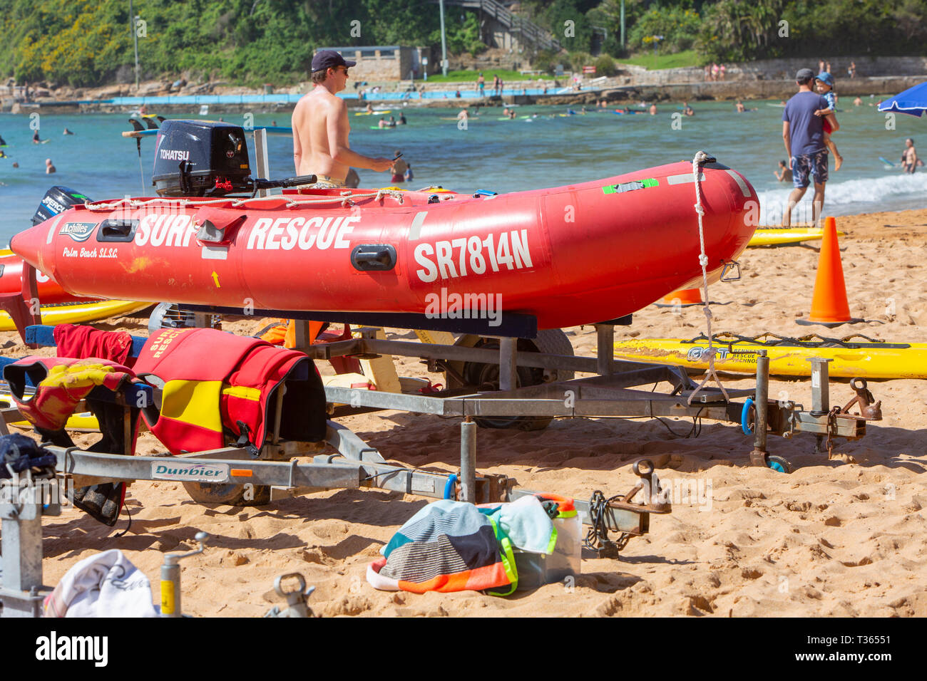 Surf rescue lifeguard equipment including dinghy with outboard and